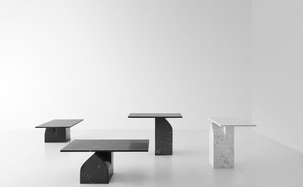 tables in white carrara marble or black marquina marble designed for Marsotto edizioni